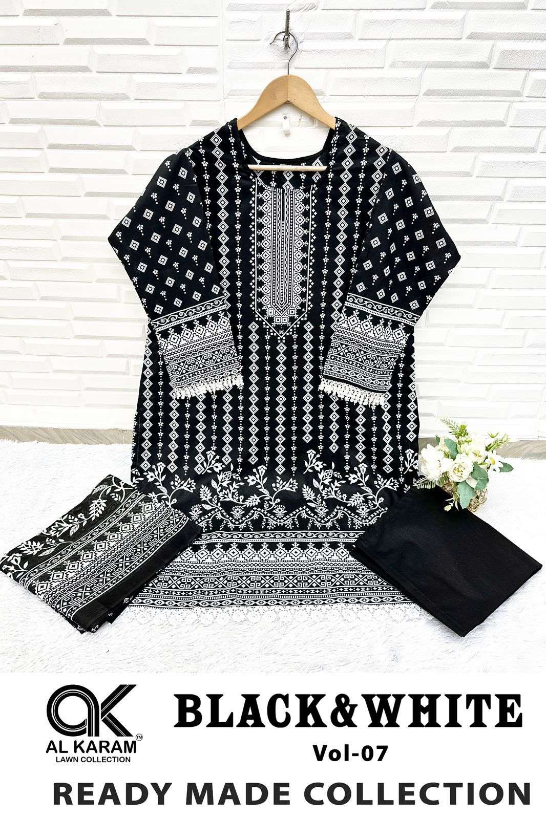 BLACK AND WHITE STICH SUITS READY WEAR BY AL KARAM-03